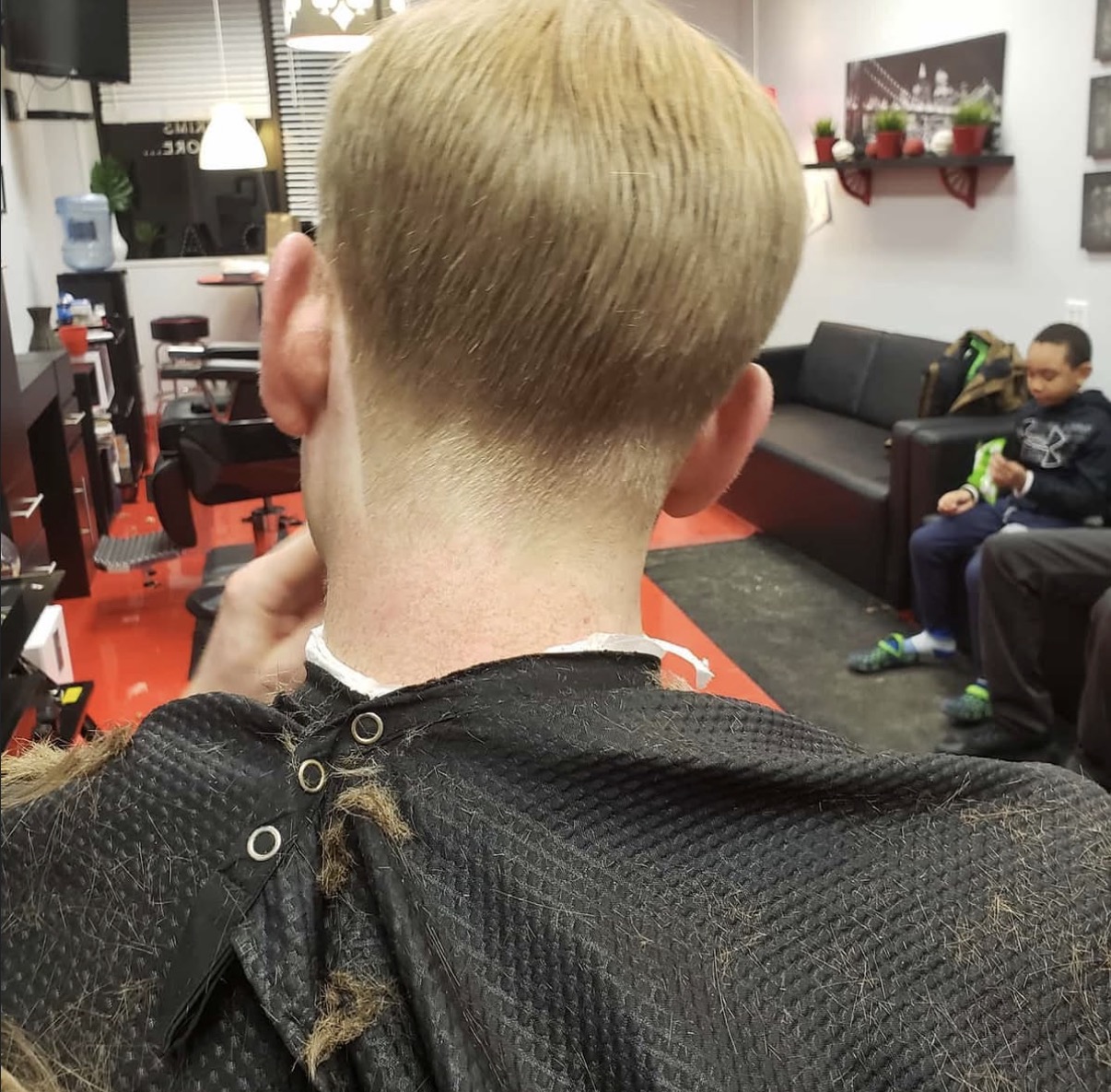 Back view of a clean tapered neckline